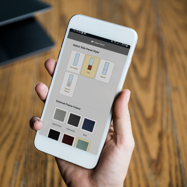 The Palladio door designer on a phone